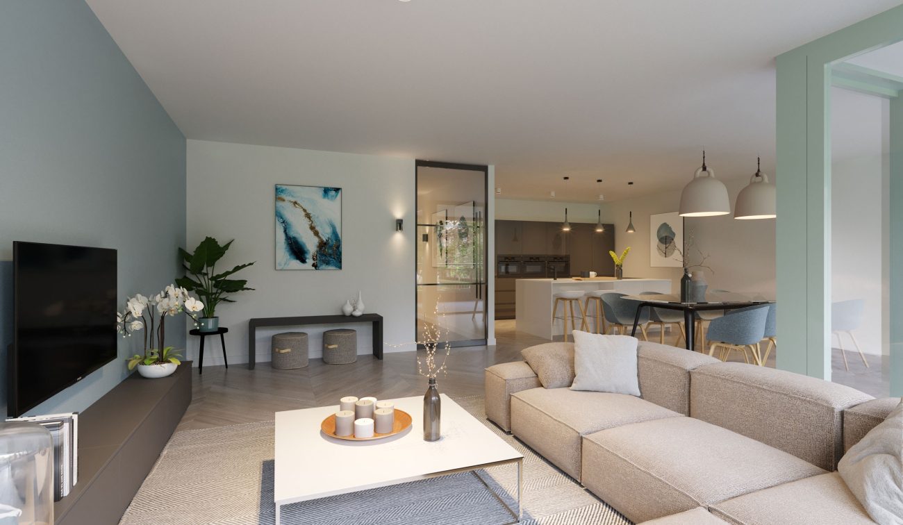 Impressie van de woonkamer in het nieuwbouwproject met 60 appartementen aan de Kloosterstraat in Tilburg, met modern interieur en veel lichtinval.