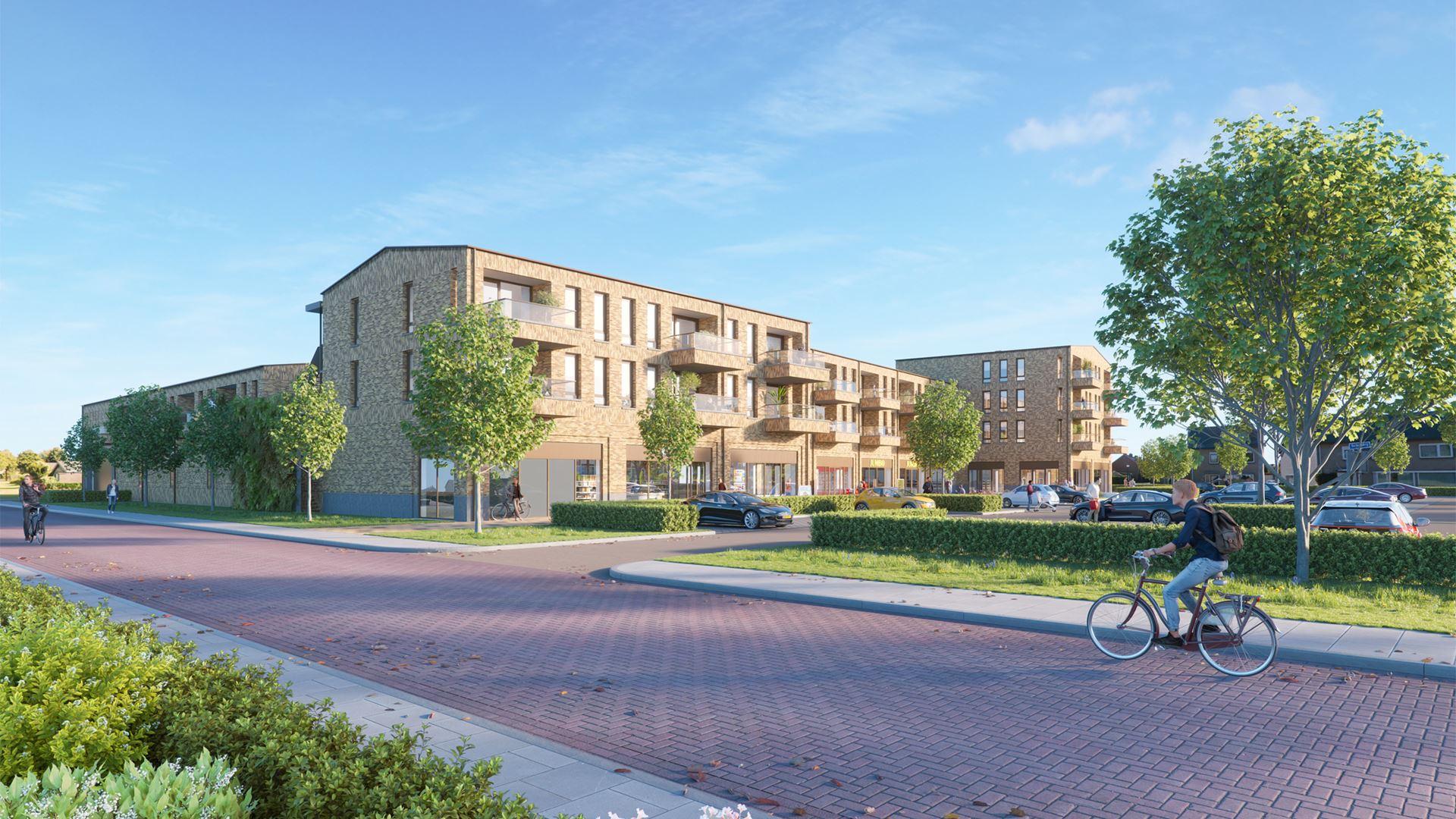 Impressie van appartementencomplex met balkons, commerciële plint en groen langs woonstraat