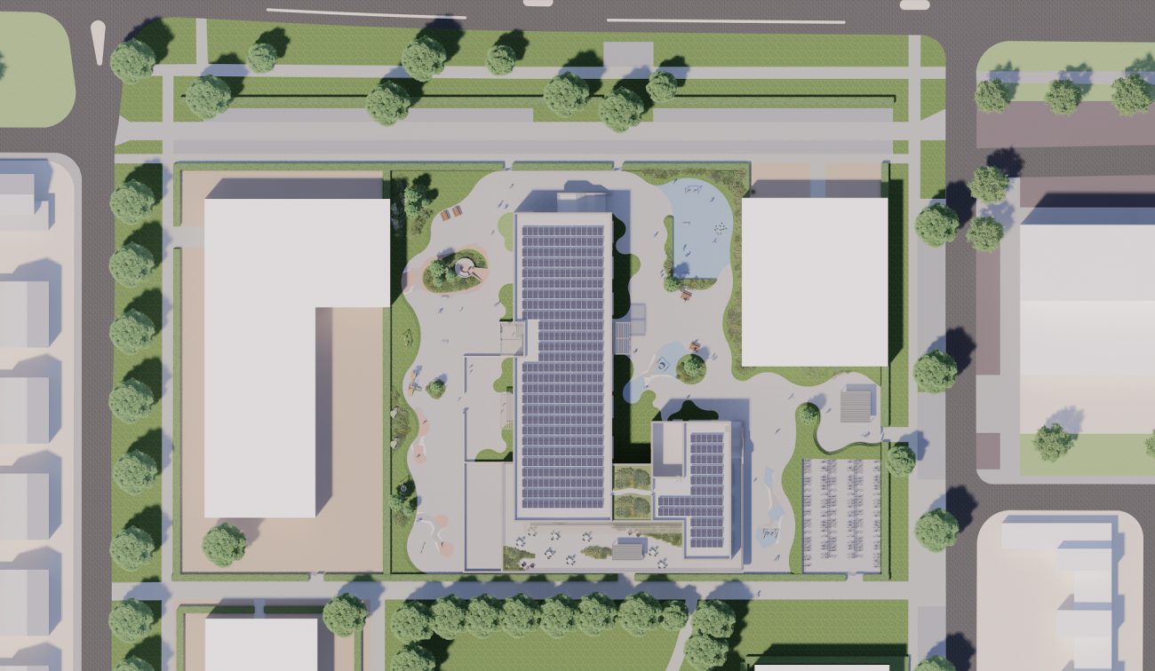 Kernkindcentrum Maastricht-West – impressie van licht bakstenen school met brede buitentrap, speelplein en groen ingericht terrein