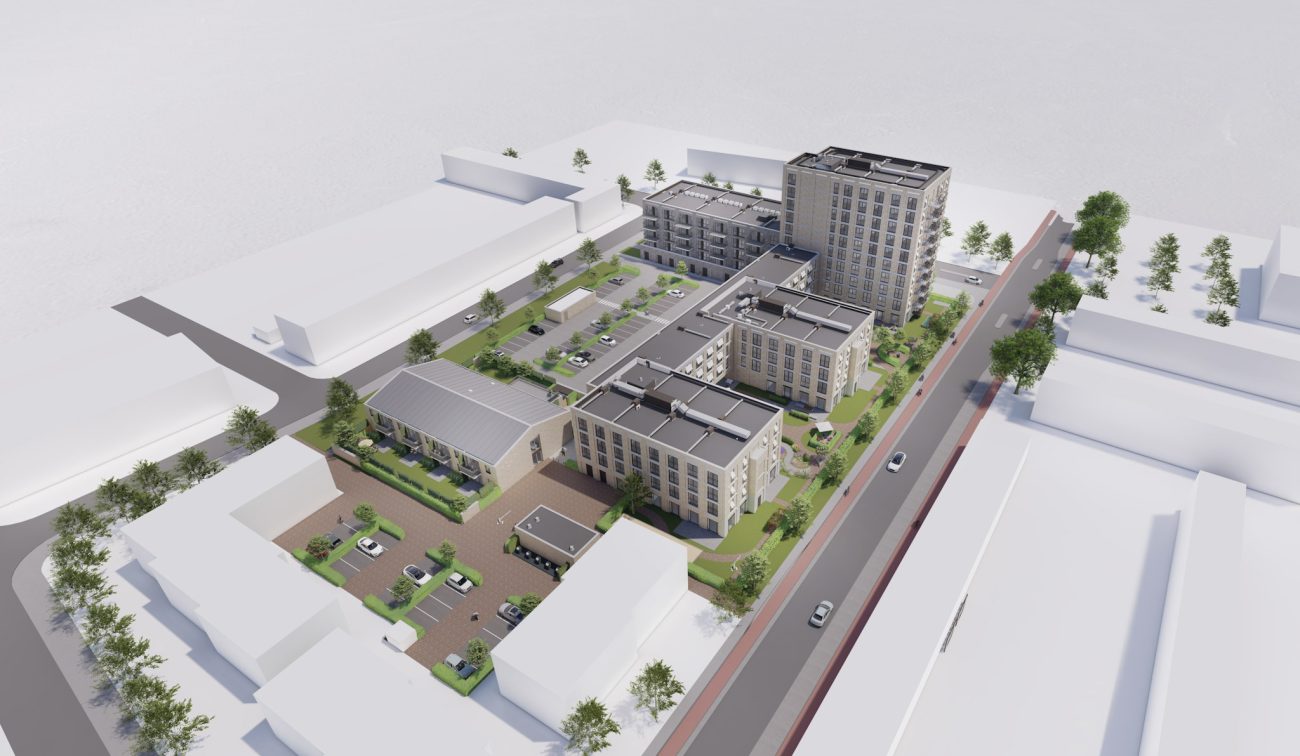Luchtimpressie van nieuwbouwproject Kievitshorst in Tilburg, met meerdere moderne woongebouwen, groene binnenhoven en parkeerplaatsen binnen het bouwblok.