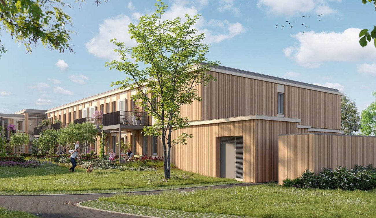 Woningbouw met houten gevels en balkons rond groene binnentuin