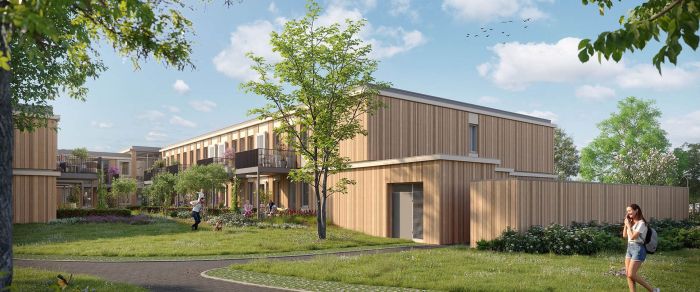 Woningbouw met houten gevels en balkons rond groene binnentuin