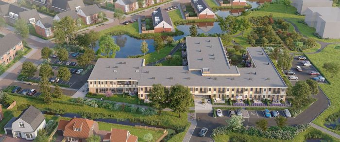 Woningbouw in vogelperspectief met binnentuin, vijver en omliggende woonstraten
